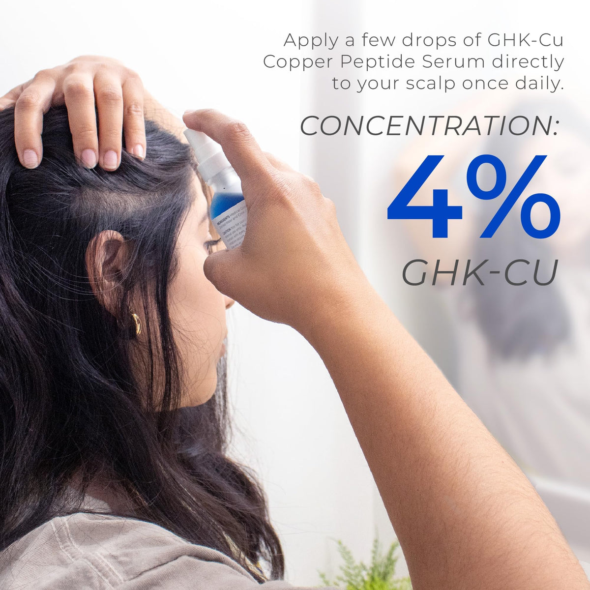 Neurogan applying spray to scalp to promote easy daily use