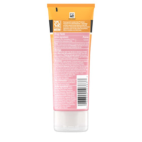 Neutrogena 3oz bottle next to common items showing compact travel benefit