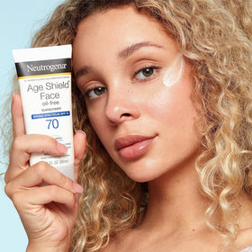 Neutrogena Age Shield lotion texture close-up showing lightweight, sheer finish