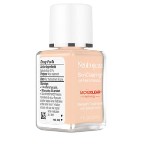 Neutrogena bottle in hand to show size and travel-friendly benefit
