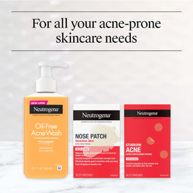 Neutrogena bottle held by hand to show 9.1 fl oz size and travel convenience