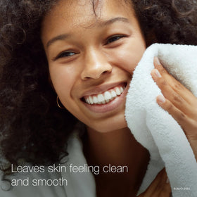 Neutrogena rinsing action showing cleanser washing away oil