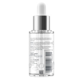 Neutrogena bottle on vanity in natural light conveying daily routine glowing benefit