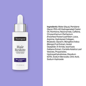 Neutrogena massaging serum into roots to improve scalp absorption and coverage
