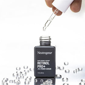 Neutrogena serum held in hand to show size and easy application benefit