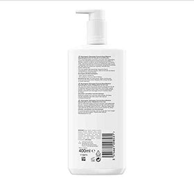 Neutrogena bottle beside ruler showing 13.5oz scale and generous size