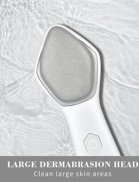 NEWDERMO large diamond head closeup highlighting textured surface for effective exfoliation