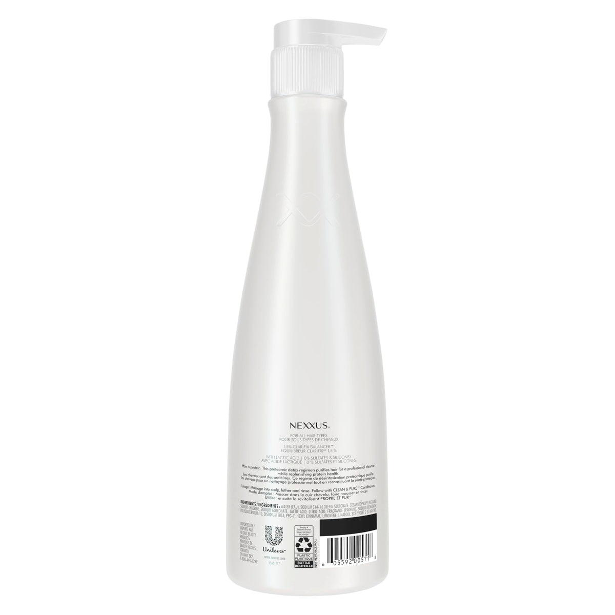 Nexxus 13.5 oz bottle beside common items showing scale and travel-friendly size