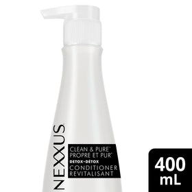 Nexxus cream texture close-up highlighting smooth formula for easy detangling