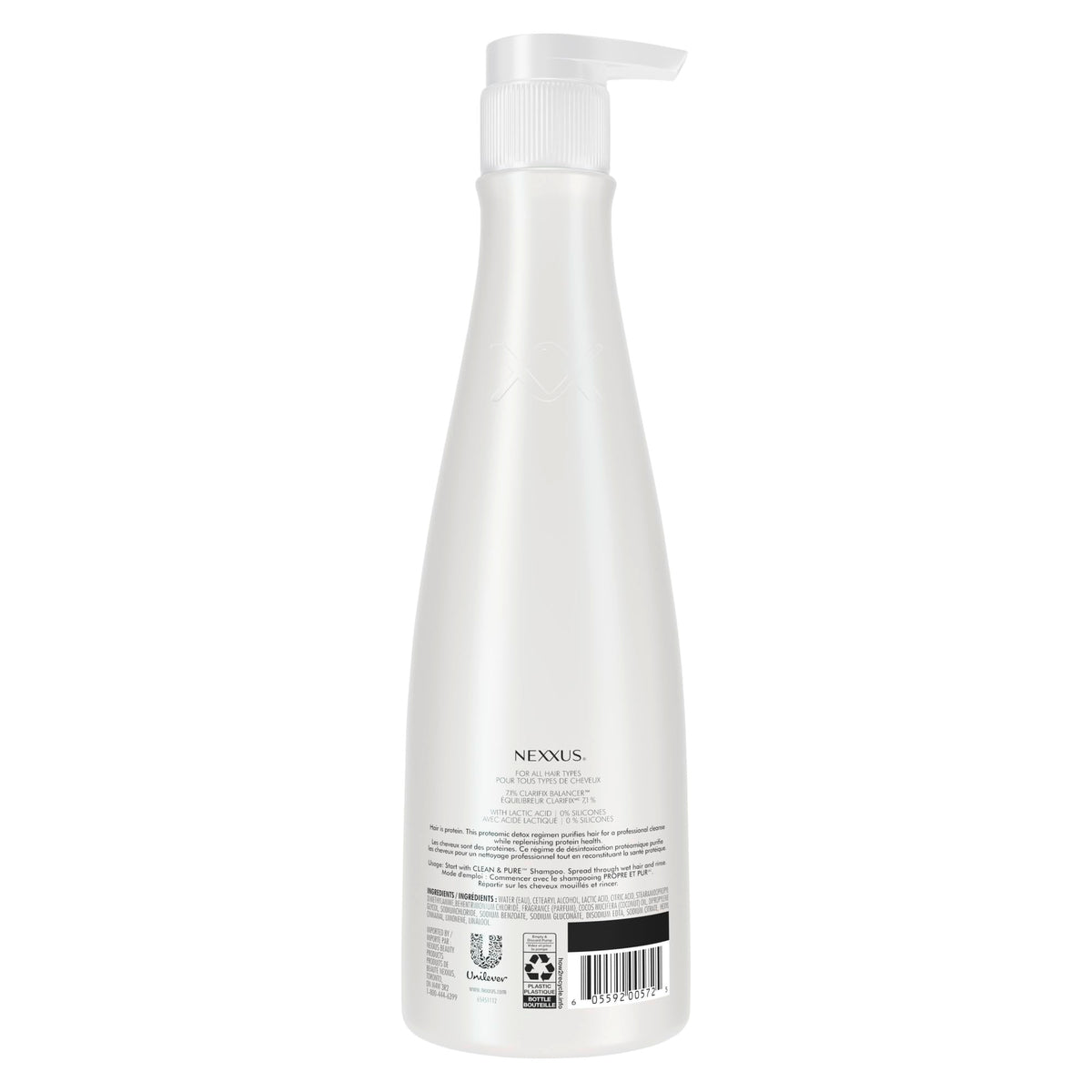 Nexxus 13.5 oz bottle next to ruler showing size and clear product label