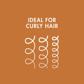 Nexxus leave-in applied to curly hair demonstrating easier styling