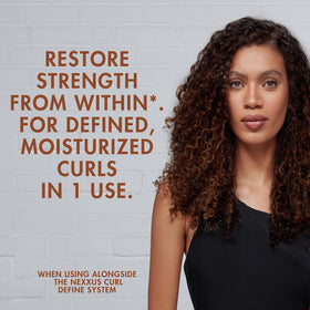 Model with defined curls after Nexxus showing hydrated smoother hair
