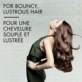 Nexxus Diametress creamy texture closeup showing lightweight nourishment benefit