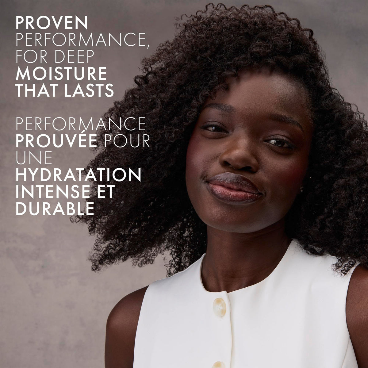 Nexxus HUMECTRESS bottle on bath shelf conveying salon-quality routine