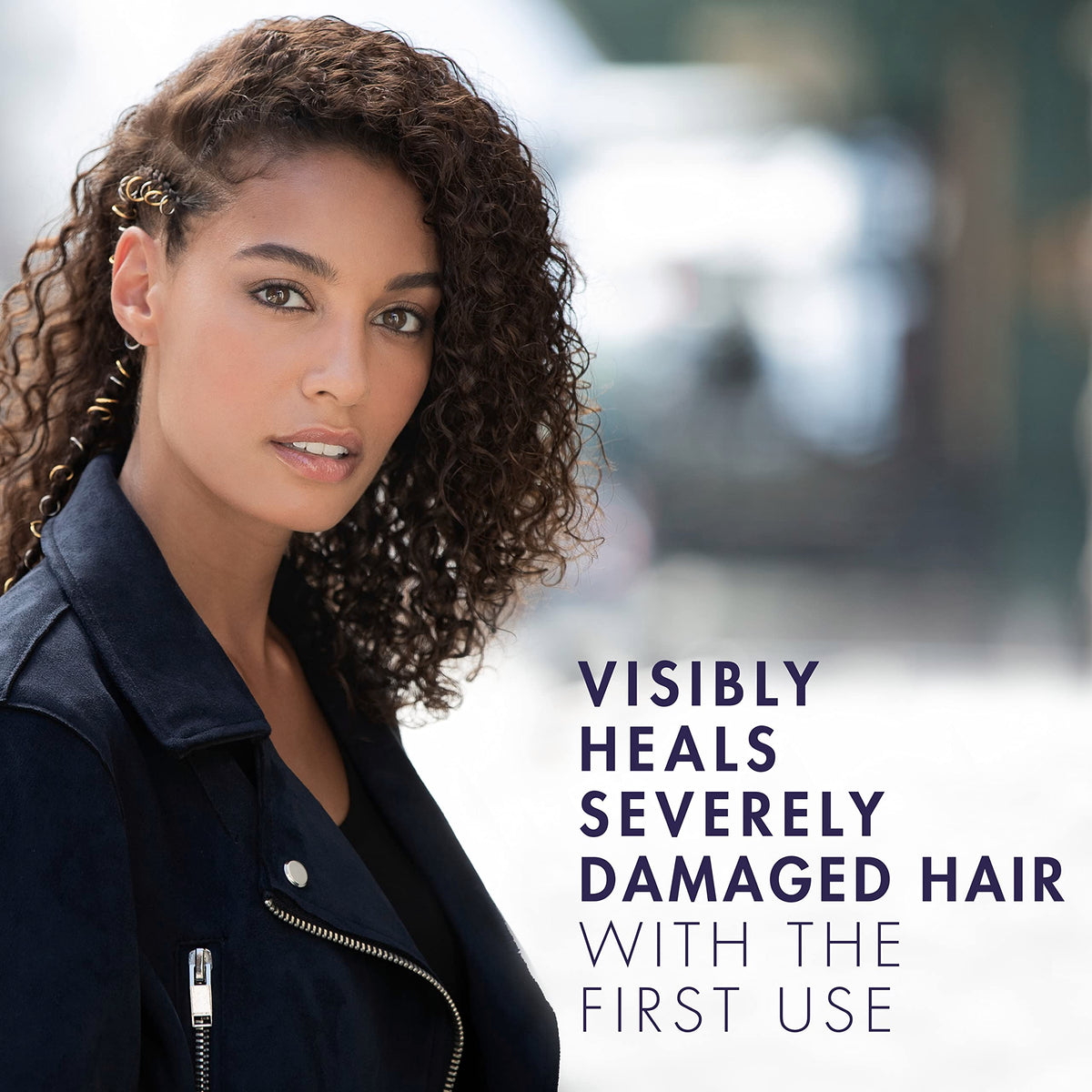 Nexxus Keraphix in-shower use on wet hair demonstrating effective repair routine