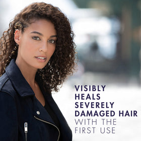 Nexxus Keraphix in-shower use on wet hair demonstrating effective repair routine