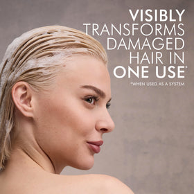 Nexxus KERAPHIX shampoo being applied in shower for visible smoothing