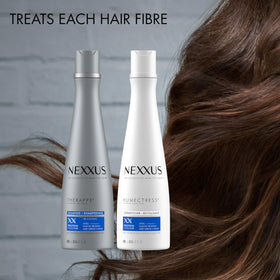 Close-up of Nexxus shampoo lather texture demonstrating rich hydration