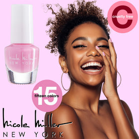 Nicole Miller bottle held in hand to show mini size and travel-friendly scale