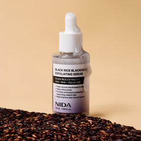 NIDA serum next to moisturizer illustrating layering in skincare routine
