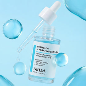 NIDA centella plant with serum, emphasizes botanical calming benefit