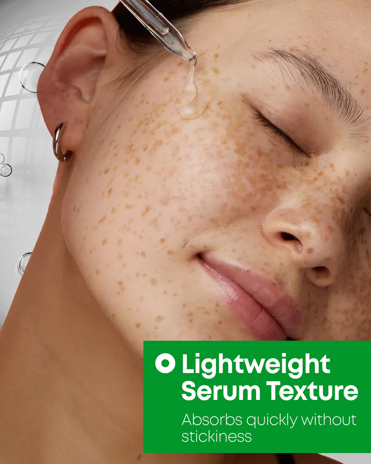 NINELESS serum on hand absorbing quickly to show lightweight hydration benefit