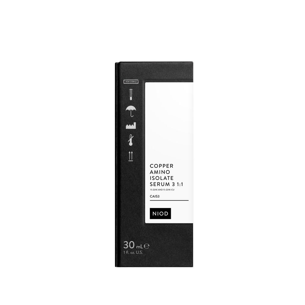 NIOD serum on vanity beside moisturizer demonstrating easy layering in routine