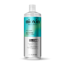 NIOXIN front bottle shot showing large 33.8 fl oz size and easy dispensing