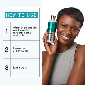 NIOXIN bottle in hand to show scale and large 1000 mL value