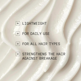 NIOXIN conditioner staged on bath shelf suggesting daily use and routine fit