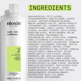 NIOXIN 16.9 fl oz conditioner on counter highlighting product size