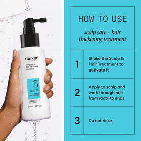 Nioxin System 3 bottle beside a hand for scale to show the 3.4 fl oz travel-friendly size