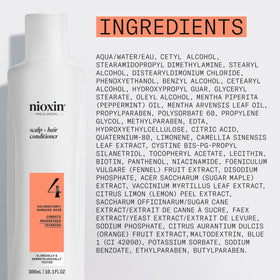 Nioxin System 4 bottle on bathroom shelf in lifestyle scene, supports daily routine