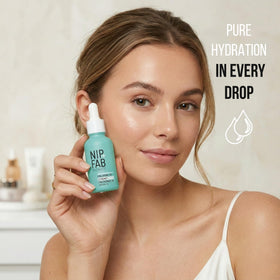 Nip+Fab open dropper releasing a droplet showing precision dosing