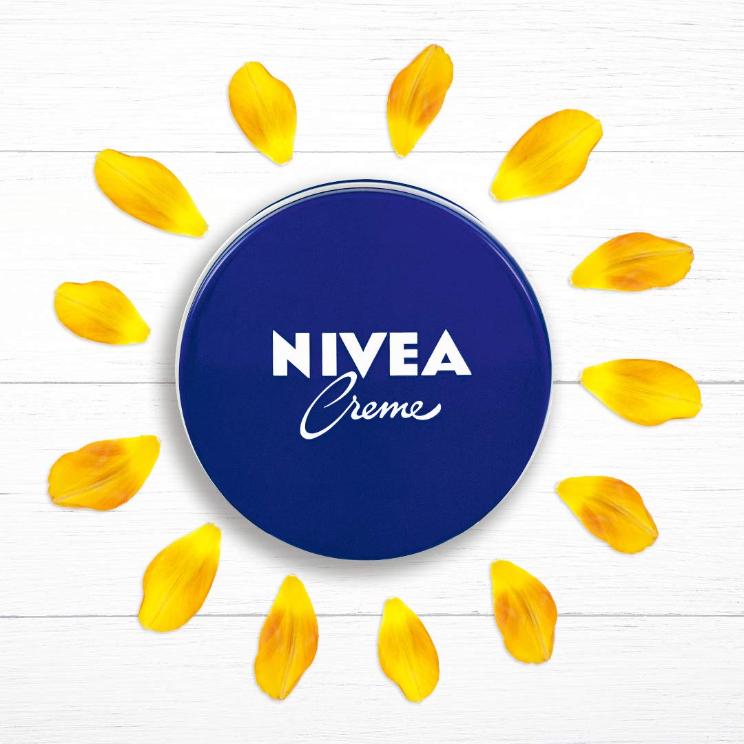 NIVEA open tub with cream exposed demonstrating scoopable formula and ease of use