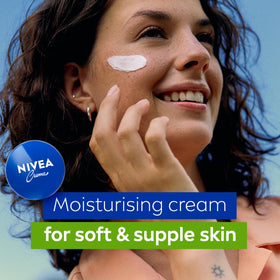 NIVEA cream applied to hand close-up illustrating quick relief and softness