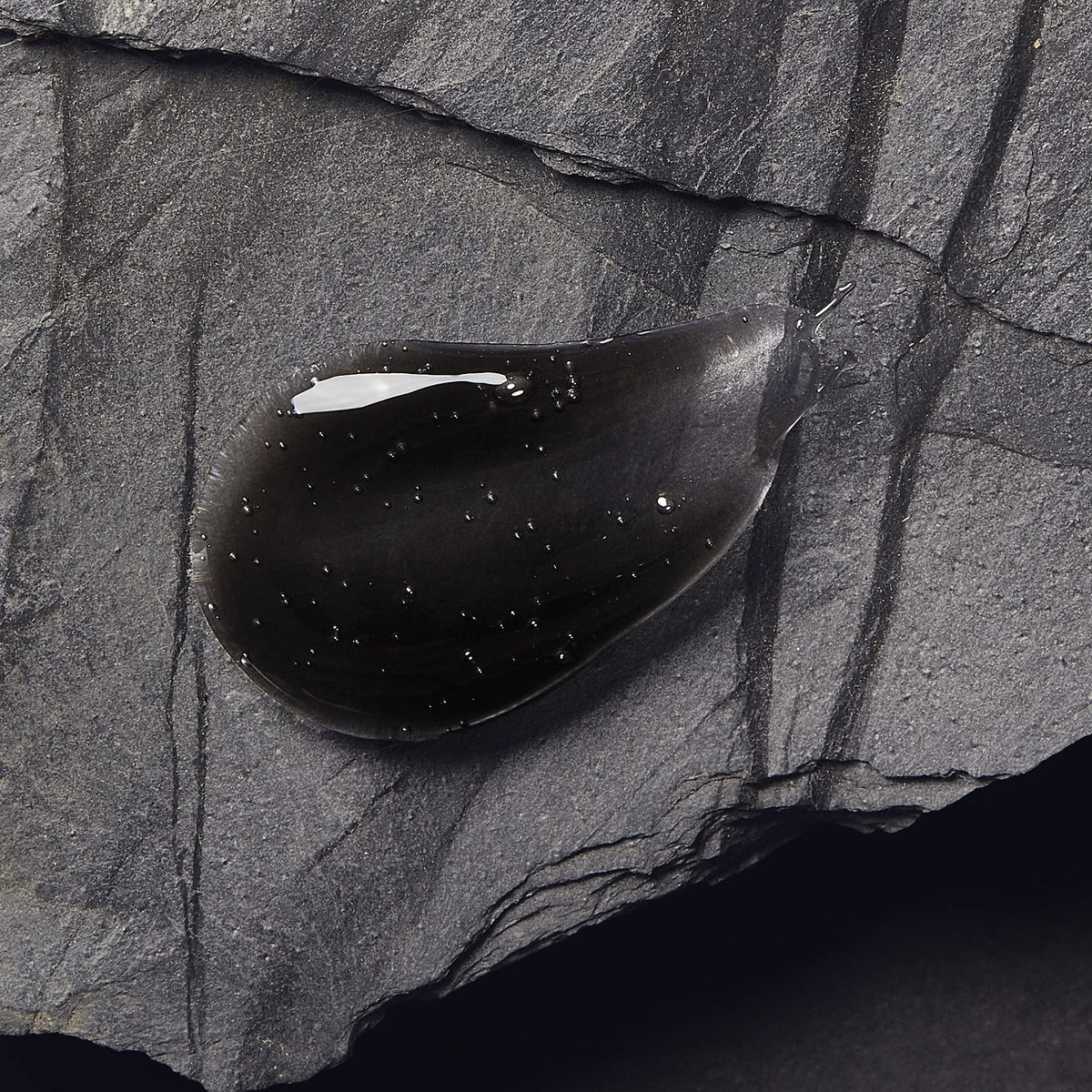 NIVEA MEN close-up of gel texture showing rich charcoal cleansing action