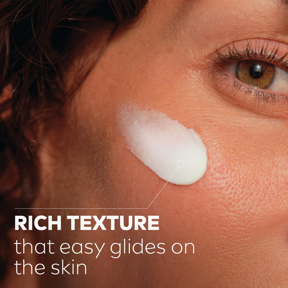 NIVEA Q10 Plus applied on hand illustrating easy spreadability and hydration