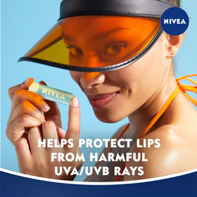NIVEA stick open showing balm texture and quick hydration benefit