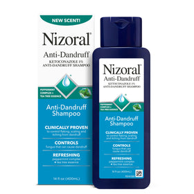 Nizoral front packaging showing peppermint tea tree scent and 14 fl oz size benefit clarity