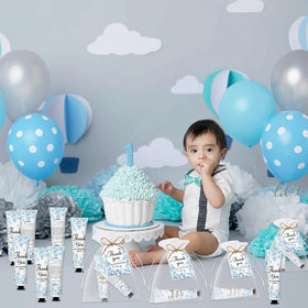 Nlicrst favors displayed on a baby shower table creating elegant coordinated décor