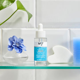 No7 serum with other skincare items in flatlay suggesting routine compatibility