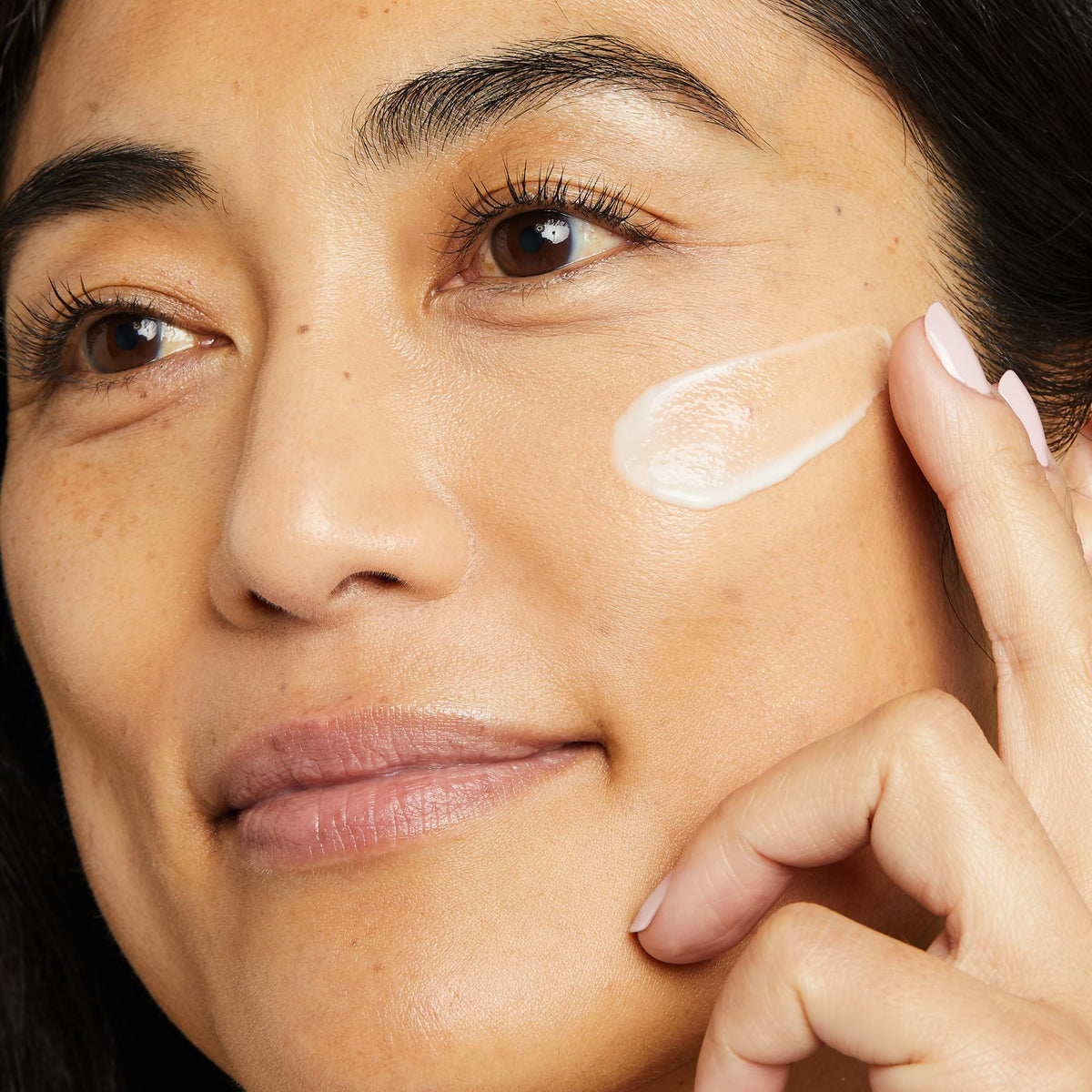 No7 serum on hand demonstrating lightweight texture and spreadability
