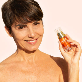 Noche Y Dia bottle in bathroom lifestyle setting promoting routine