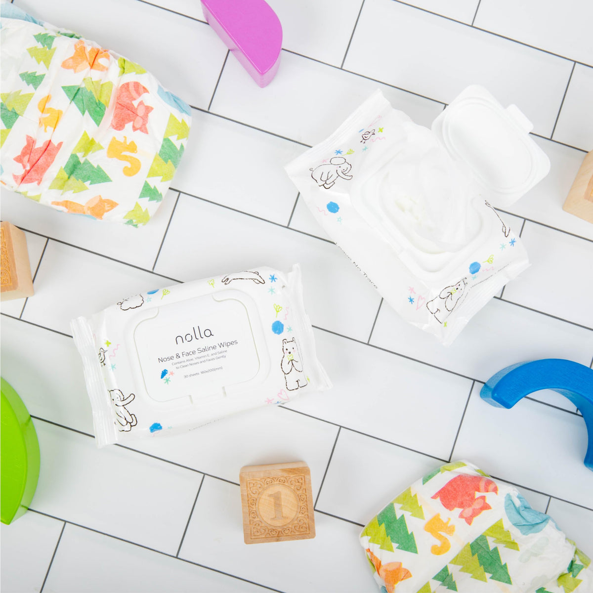 Nolla wipes placed inside a diaper bag showcasing on-the-go practicality