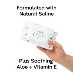 Nolla wipe gently cleaning a baby's nose demonstrating gentle saline cleansing