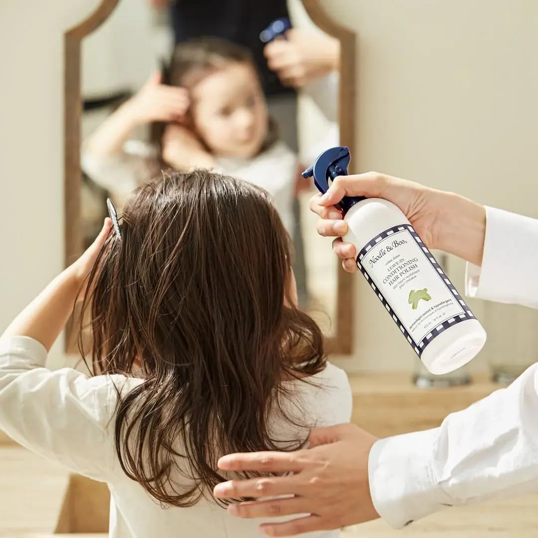 Noodle & Boo used on baby hair in a nursery setting to refresh and smooth