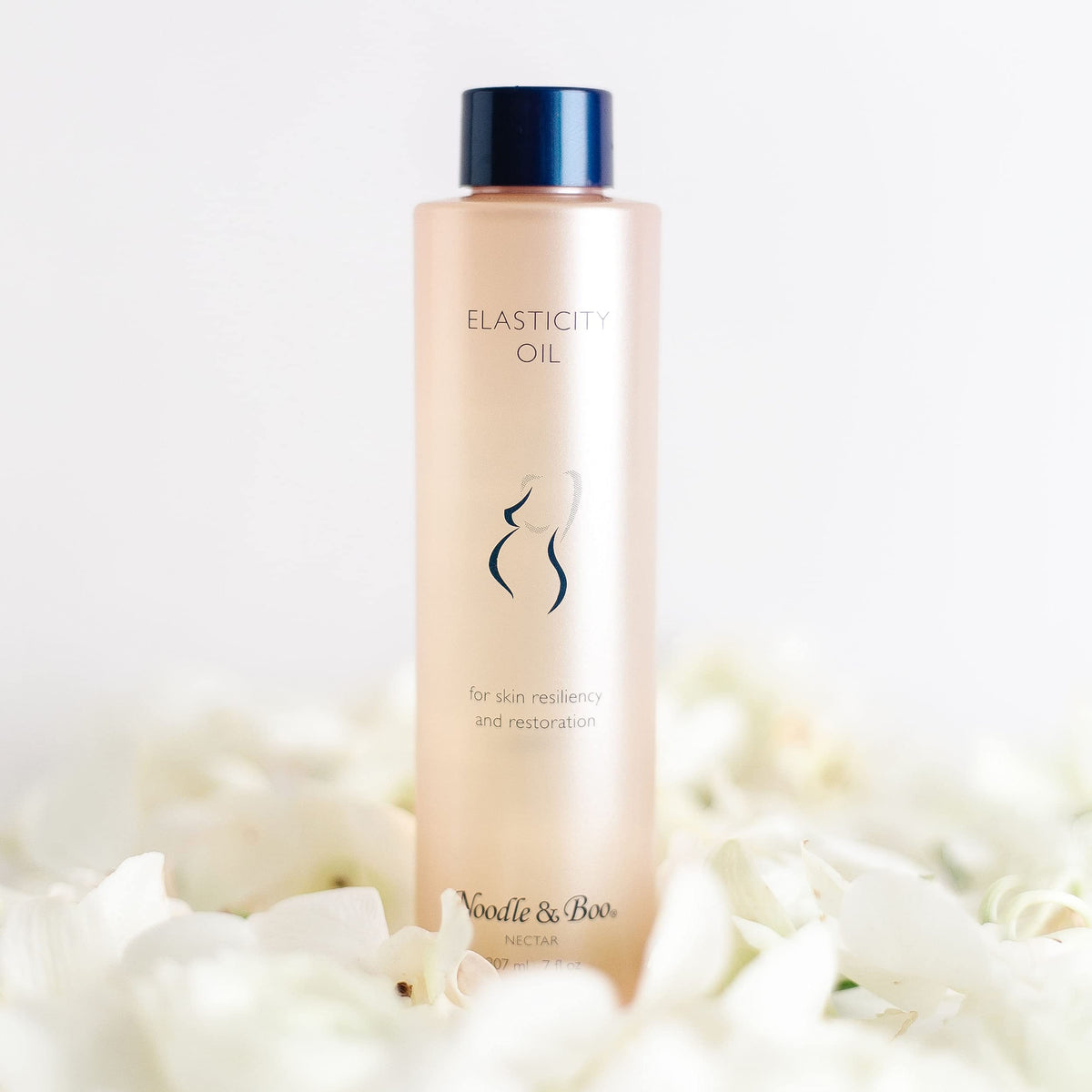 Noodle & Boo close-up of oils and botanicals highlighting nourishing ingredients