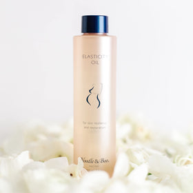 Noodle & Boo close-up of oils and botanicals highlighting nourishing ingredients