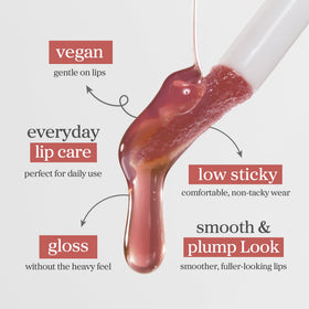 NOONI layered over lipstick adding glossy shine and extended wear